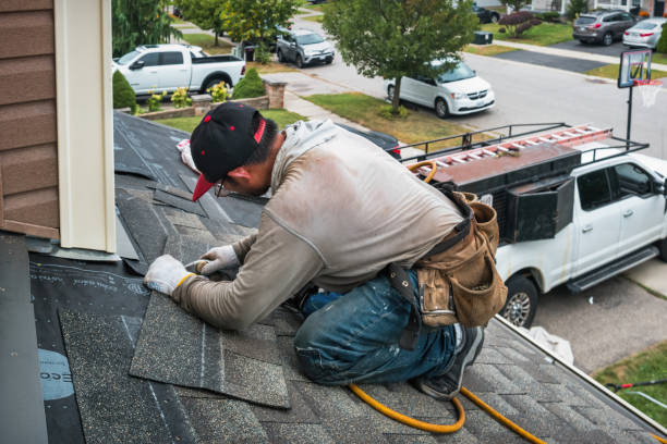 Professional Roof Replacement technician working in West Harrison, IN